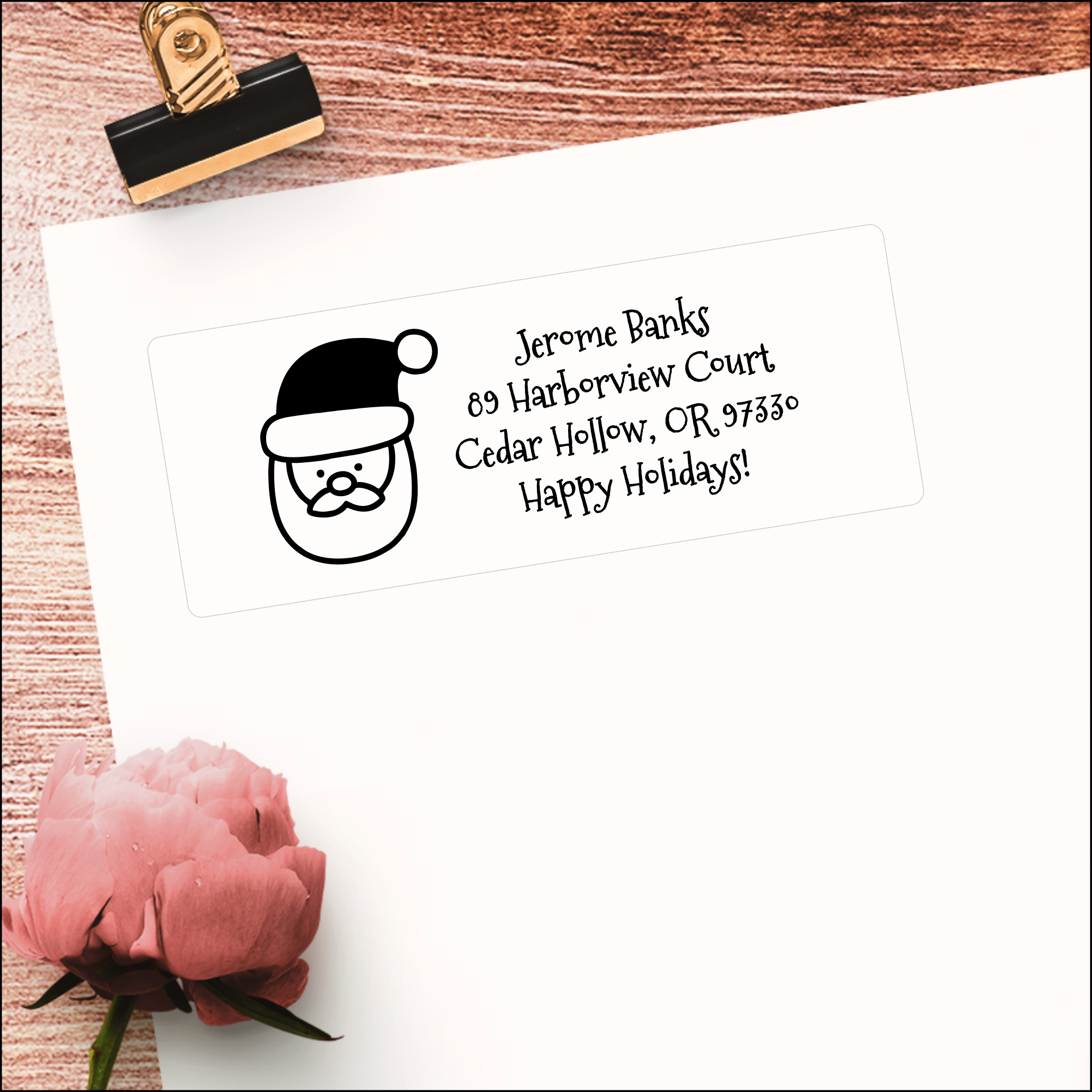 Santa Claus Christmas label on top of a white envelope Santa Claus Christmas label on top of a white envelope